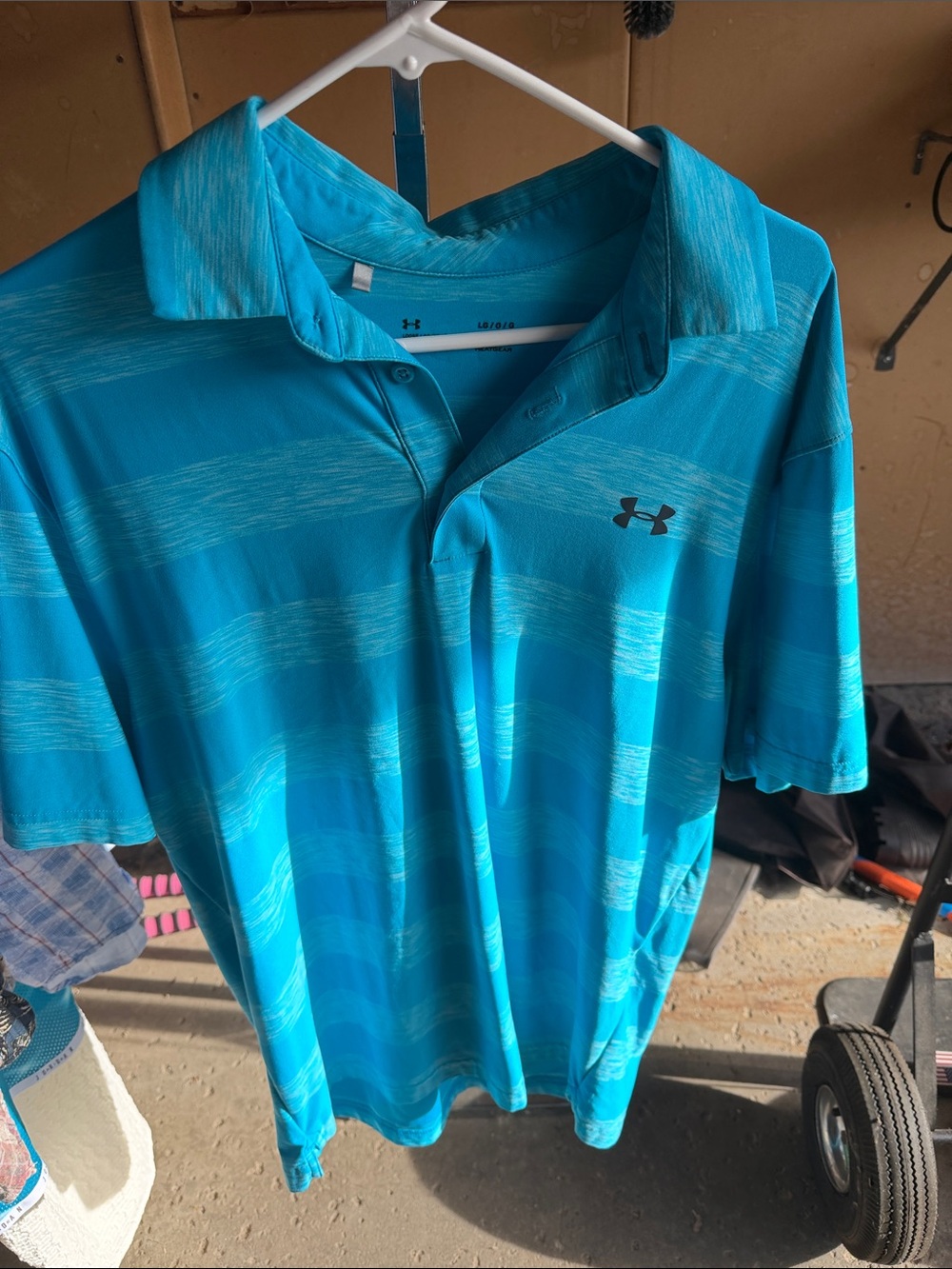 Under Armour Men’s Bright Teal Striped Performance Polo